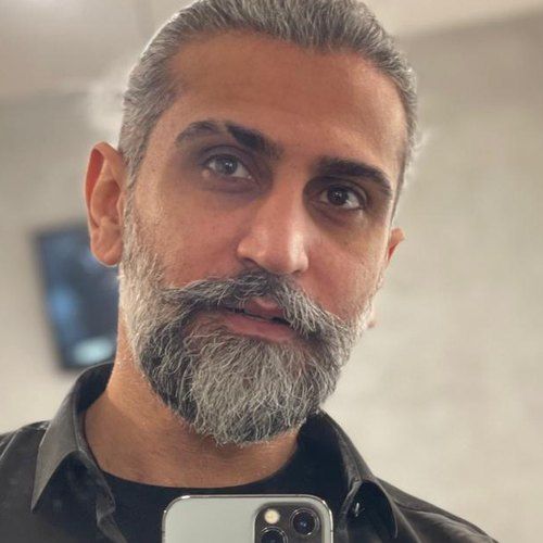 Husam, barbiere